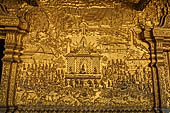 Luang Prabang, Laos - Wat Mai the gilded stucco engravings narrate the Vessantara Jataka, the penultimate rebirth as a human of the future Gotama Buddha.